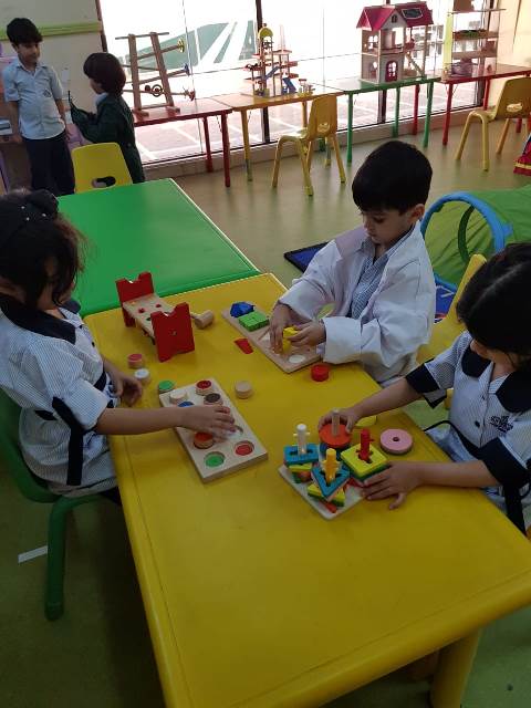 Working on our wooden puzzles